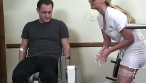 Busty nurse Phoenix Marie sucking cock in the gym